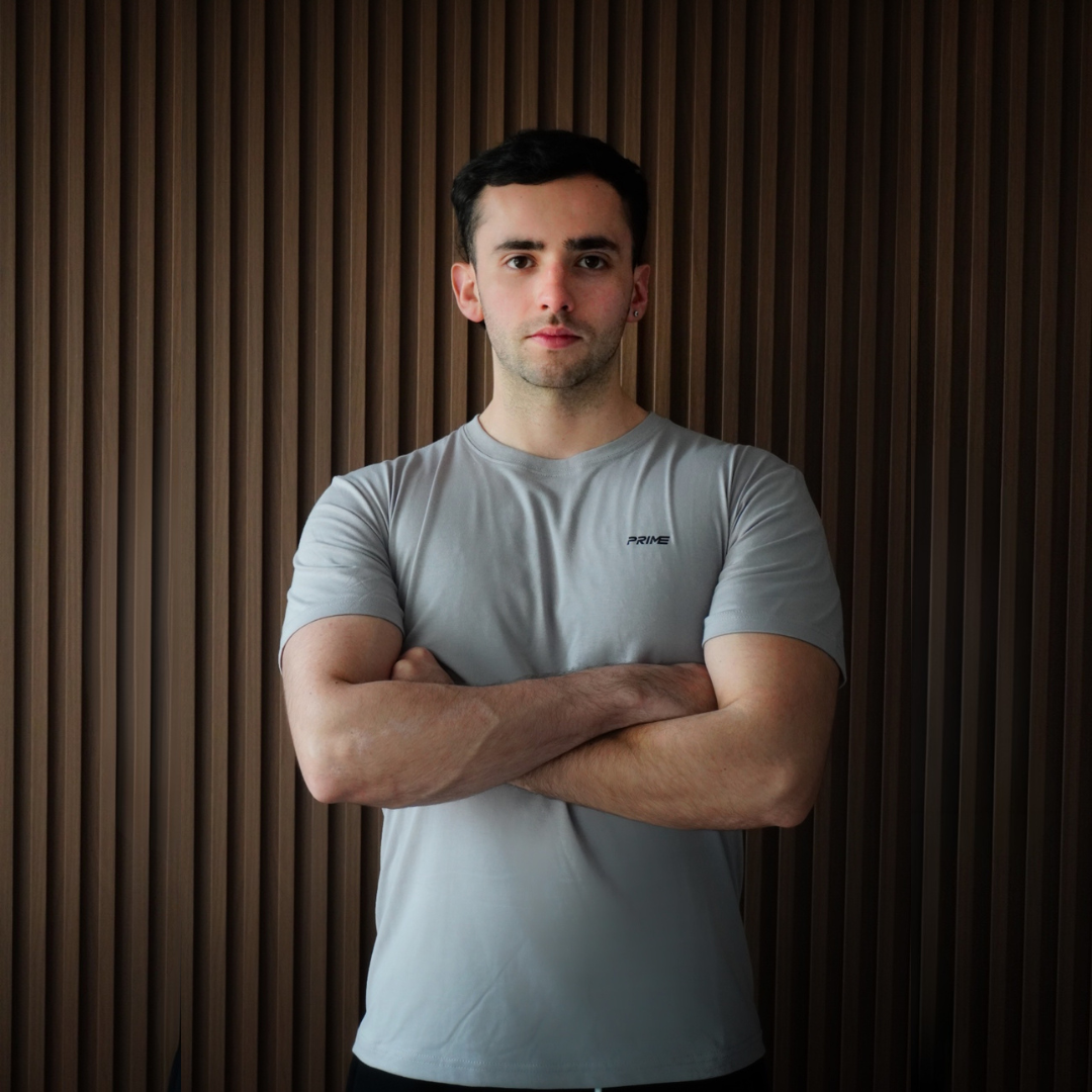 POLERA RRASTRO GRIS